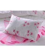 Elegant flowers are embroidered on this comfy pillow from the Tutu bedding collection.